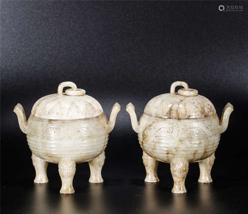 A pair of white jade carved tripod censers