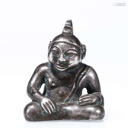 Siliver seated figurine of Hu people