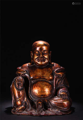 Gold painted wood carved statue of buddha