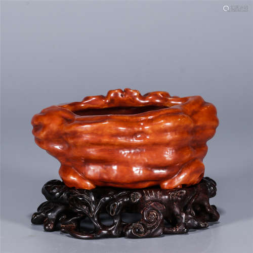 A small coral red glazed ganoderma shaped porcelain water pan