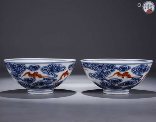 A pair of blue and white red glaze cloud and bat drawing porcelain bowls