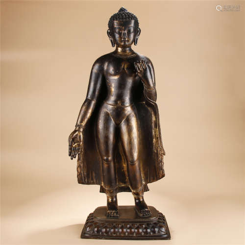 Gilt bronze standing statue of Sakyamuni buddha