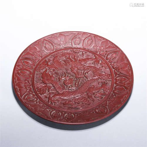 Red lacquer carved cloud and dragon pattern plate