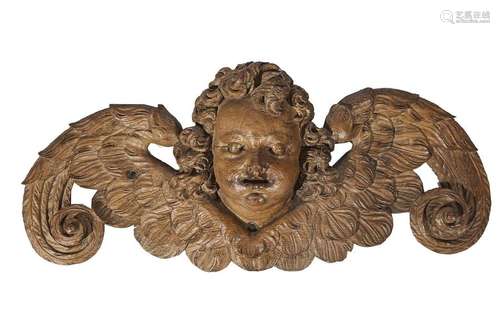 262 Tête d'ange en chêne sculpté. XVIIème siècle …