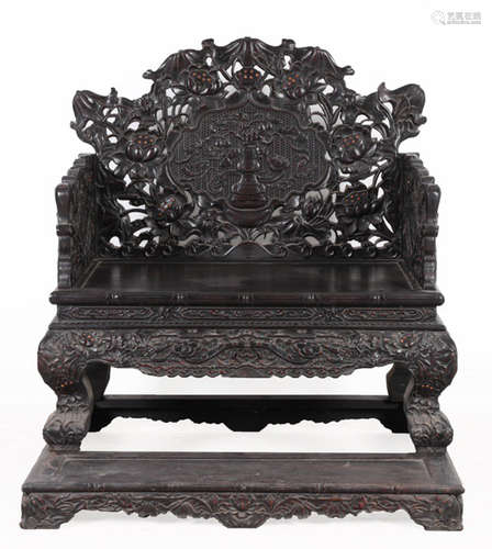 A ZITAN WOOD CHAIR CARVED WITH LOTUS