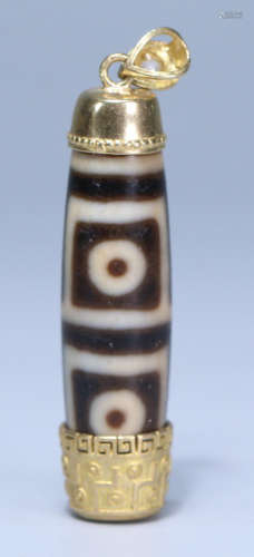 A FOUR EYES PATTERN DZI EMBEDDED WITH GOLD