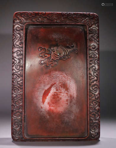 AN INK SLAB CARVED WITH BEAST
