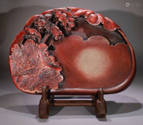 AN INK SLAB CARVED WITH FLOWER