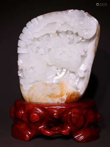 A HETIAN JADE ORNAMENT CARVED WITH FLOWER