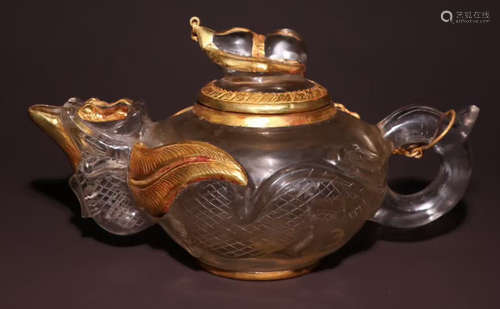 A CRYSTAL TEA POT EMBEDDED WITH GOLD