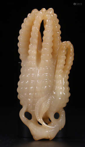 A HETIAN JADE PENDANT SHAPED WITH CHAYOTE