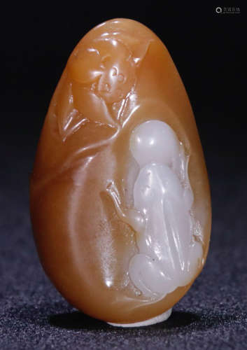 A HETIAN JADE PENDANT CARVED WITH FROG