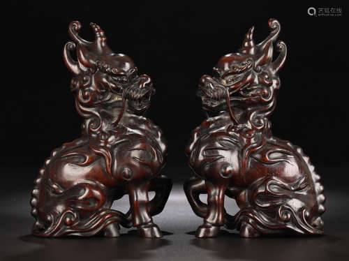 PAIR OF ZITAN WOOD QILIN ORNAMENT