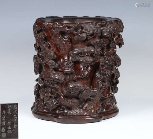 A CHENXIANG WOOD BRUSH POT CARVED WITH PINE