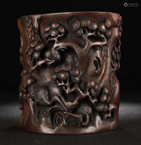 A CHENXIANG WOOD BRUSH POT CARVED WITH PINE