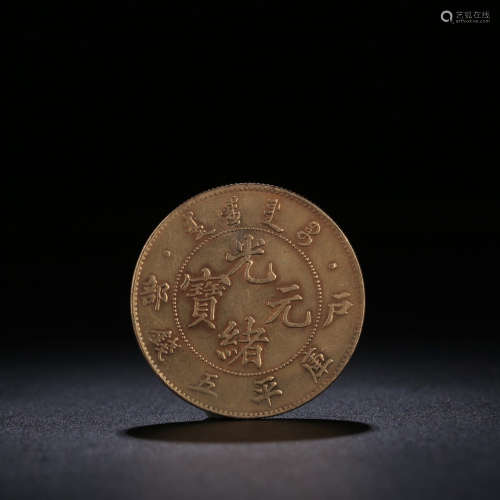 A CHINESE GILD BRONZE COIN