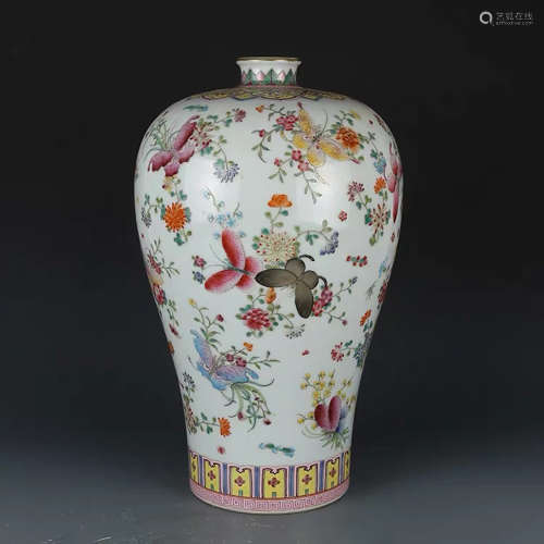 A CHINESE FAMILLE ROSE BUTTERFLY AND FLOWER PAINTED PORCELAIN VASE