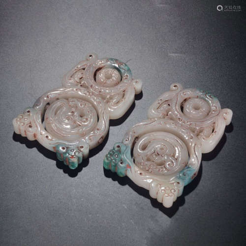 A PAIR OF CHINESE JADE CARVED CHI DRAGON PATTERN PENDANTS