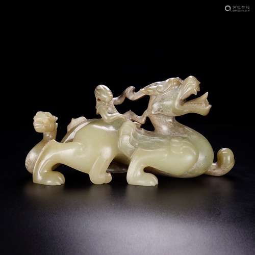 A CHINESE HETIAN JADE CARVED BEAST ORNAMENT