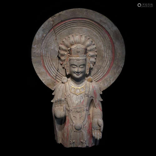 A CHINESE CARVED BODHISATTVA STATUE