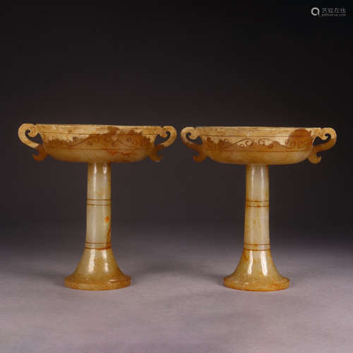 A PAIR OF CHINESE HETIAN JADE CARVED CANDLESTICK