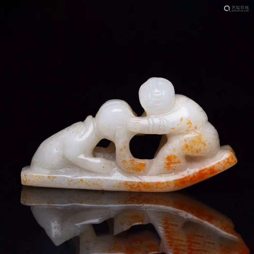 A CHINESE JADE CARVED BOYS ORNAMENT