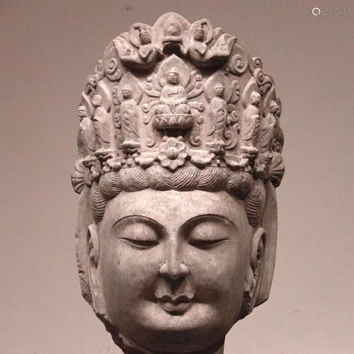 A CHINESE CARVED BUDDHA'S HEAD ORNAMENT