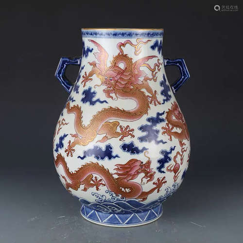 A CHINESE BLUE AND WHITE IRON RED DRAGON PATTERN PORCELAIN ZUN