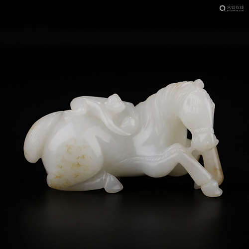 A CHINESE HETIAN JADE CARVED HORSE ORNAMENT