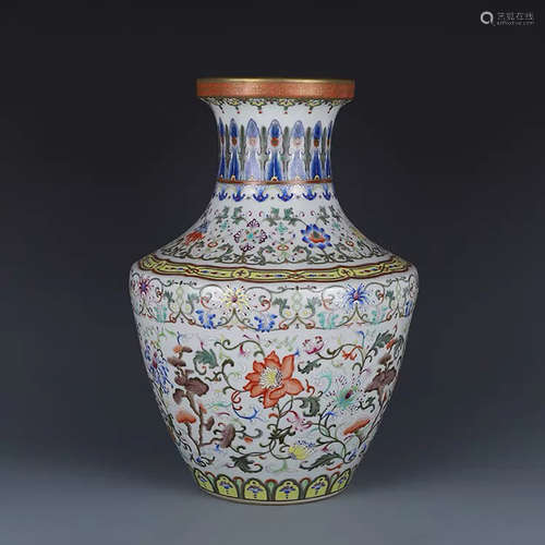 A CHINESE FAMILLE ROSE TWINING LOTUS PATTERN PORCELAIN ZUN