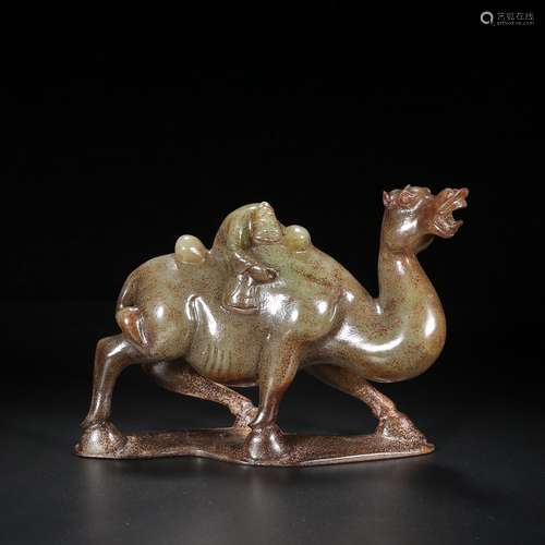 A CHINESE HETIAN JADE CARVED CAMEL ORNAMENT