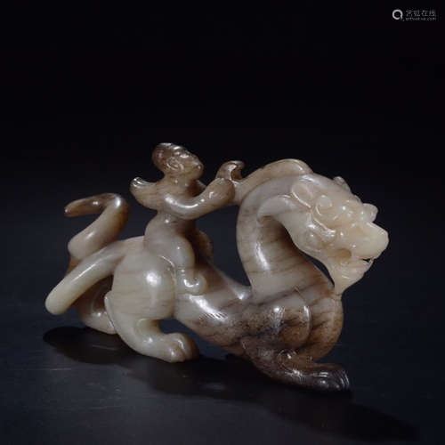 A CHINESE JADE CARVED BEAST ORNAMENT