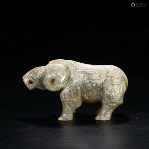 A CHINESE HETIAN JADE CARVED BEAST HANDLE ORNAMENT