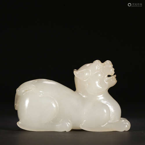 A CHINESE HETIAN JADE CARVED BEAST ORNAMENT