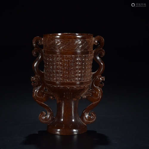 A CHINESE JADE CARVED WINE CUP
