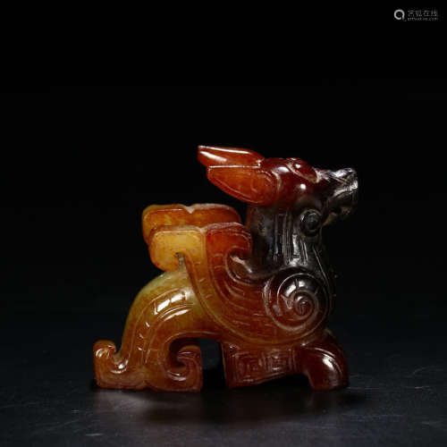 A CHINESE HETIAN JADE CARVED BEAST HANDLE ORNAMENT