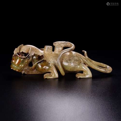 A CHINESE HETIAN JADE CARVED BEAST ORNAMENT