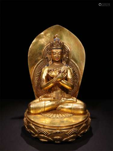 A MING DYNASTY BRONZE GILDED GUANYIN