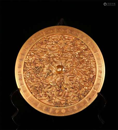 A MING DYNASTY GILDED GOLD MIRROR