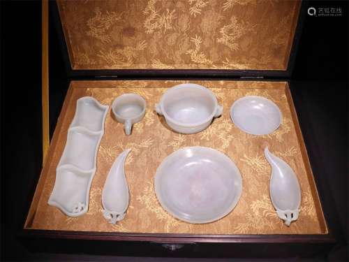 A SET OF QING DYNASTY HETIAN WHITE JADE STUDY UNITS