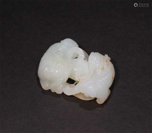 A QIGN DYNASTY HETIAN JADE DOUBLE BEAST PLAYING WITH BEAD