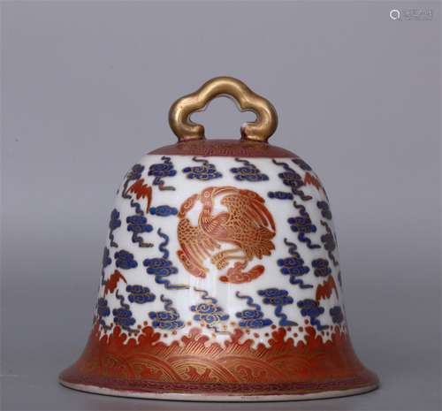 A QING QIANLONG DYNASTY ALUM RED PHOENIX BELL ORNAMENT