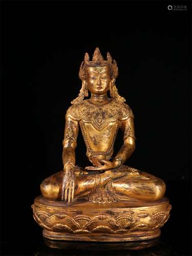 A MING DYNASTY BRONZE GILDED GUANYIN