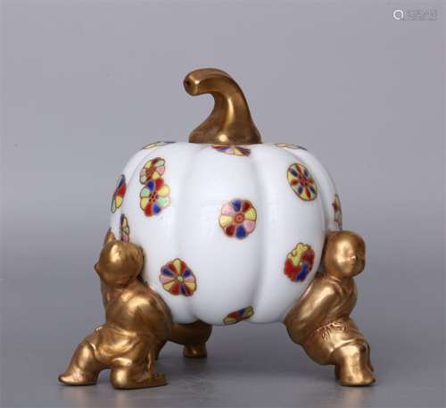 A KANGXI DYNASTY GOLD GILTED BOY'S PUMPKIN ORNAMENT