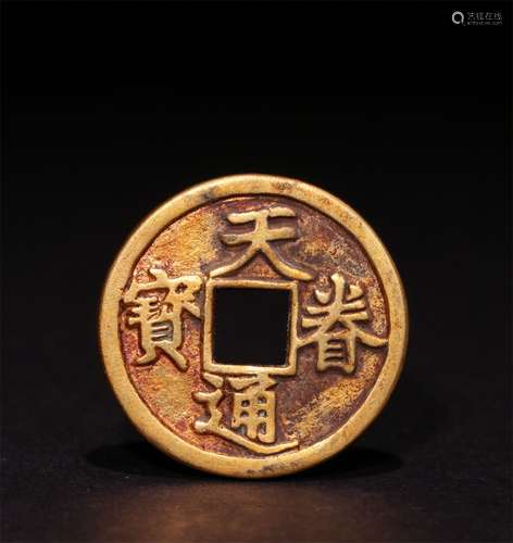 A JIN DYNASTY GOLD GILDED COIN