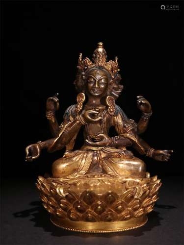 A QING DYNASTY BRONZE GILDED SIX ARMS GUANYIN