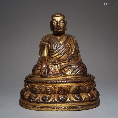 A MING DYNASTY BRONZE GILDED ZONGKABA