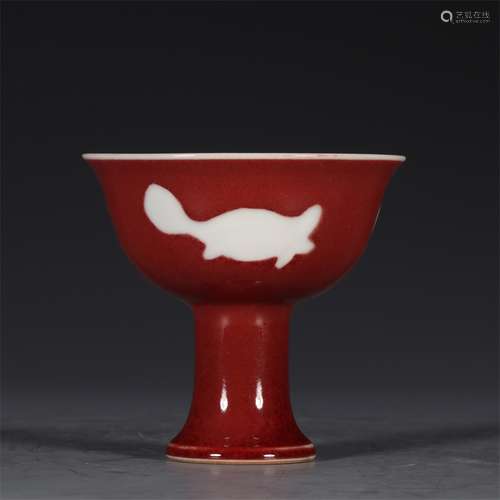 A MING XUANDE DYNASTY RED GLAZE WITH WHITE FISH GOBLET