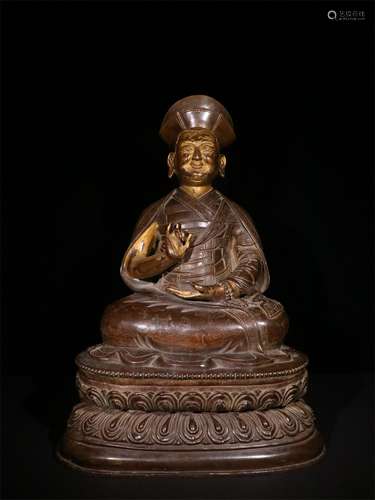 A MING DYNASTY BRONZE GILDED BUDDHA STATUE