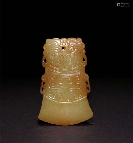 A MING DYNASTY YELLOW JADE AXE SHAPED PENDANT